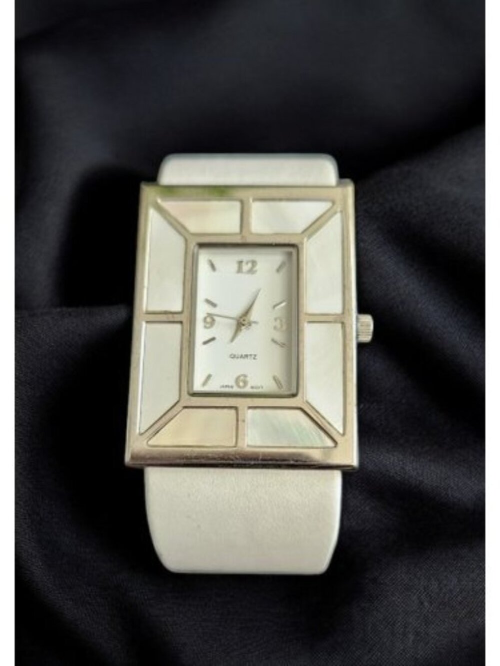 White Beveled Face Mother of Pearl Ladies Hinged Cuff Quartz Watch
